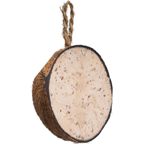 Halv kokosnød med talg og frø.